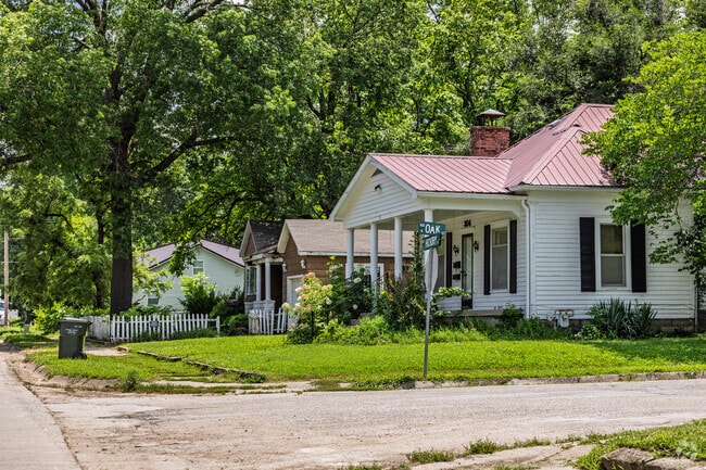 Older homes line a residential street in Nevada.