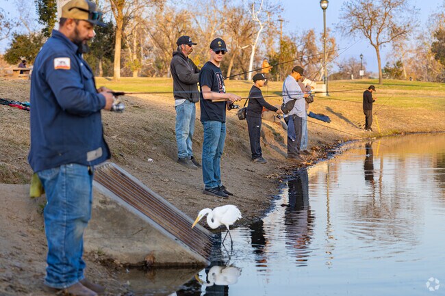 A Bakersfield fisherman keeps an eye on his competition at The Park at River Walk.