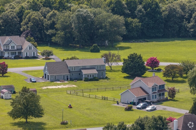 Woodside Acres consists of many sprawling fenced in homes of a variety of styles.