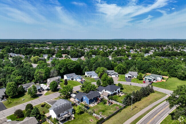 Mature trees tower over homes throughout Saint Francis.
