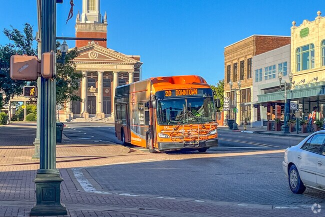 City buses frequently line up in Downtown Riverfront, ready to shuttle commuters across town.