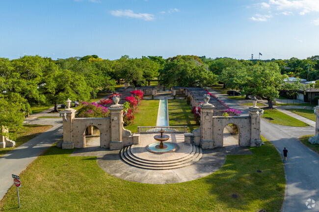 Coral Gables have limestone walls and doors at the entrances to the city.