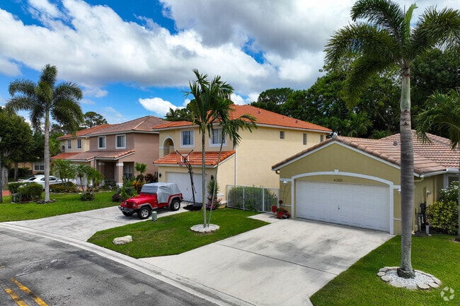 Two-story Mediterranean single-family homes line the streets of the Willoughby neighborhood.