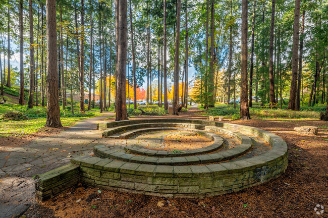 Get some fresh air at the wooded amphitheater at the Burien Community near Maplewild.