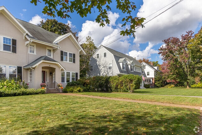 A row of homes with a contempory and a Cape Cod styled homes in Winchester.
