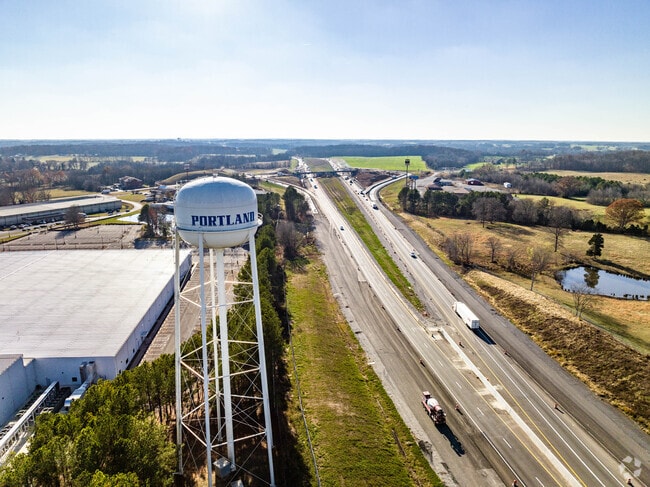 There is a large water tower at the I65 exit for Portland.