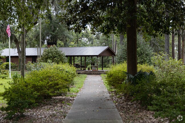 Juliette Low Park features a shaded walkway and pavilion for tranquil walks.