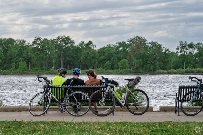 Bikers will often take a break on the benches at Riverside Park.