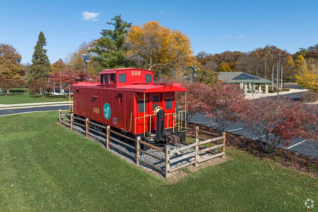 Reed Keppler Park in Chicago West features a colorful train car for visitors.