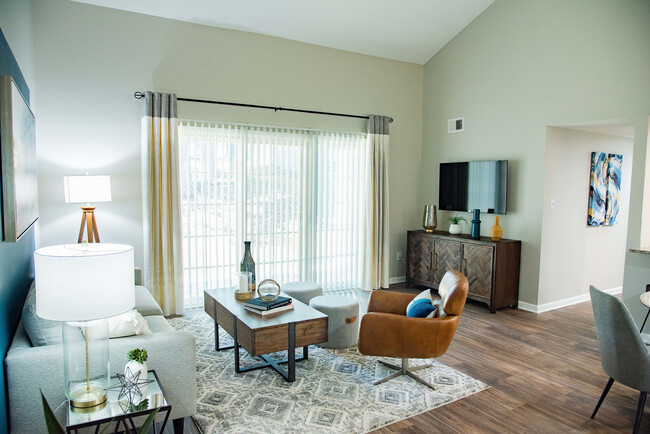 Spacious living room with hardwood-style flooring
