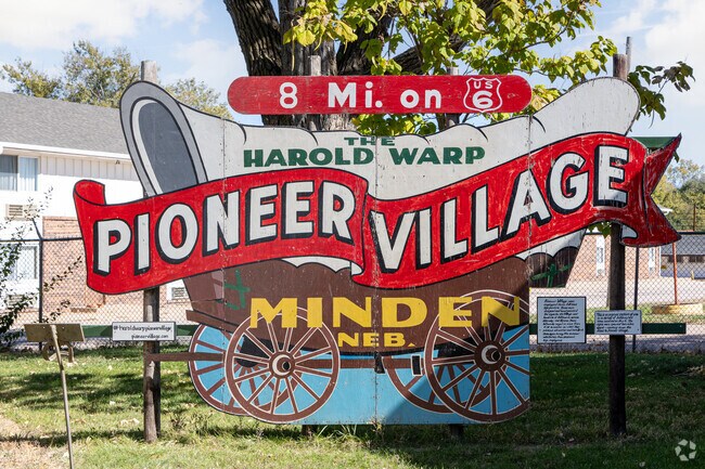 Highway signs point the way to Harold Warp’s Pioneer Village near Minden.