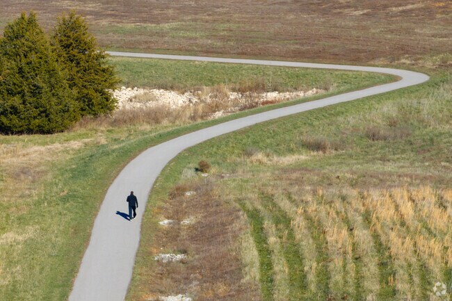 Oglesby Park has miles of both paved and natural trails for walkers.