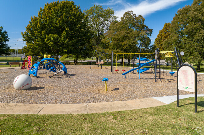 Kids can climb on the playground at Patrick Park near Dawson.