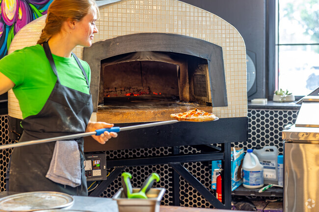 Get some great oven baked pizza at the Bird in the Horace Mann neighborhood.
