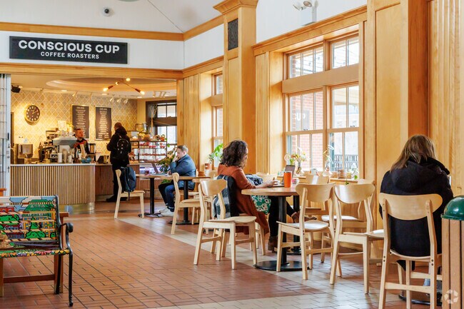 Conscious Cup Coffee Roasters are located inside a Metra Station building.
