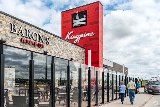 Strike up fun with bowling, arcade games, and more at Kingpinz in Centennial.