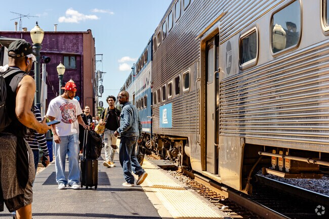 The Metra station in Elgin is 3 miles west from Corley Drive Park.