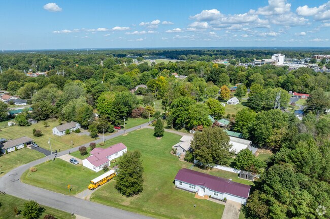 Wooded lots dot the landscape of Nolan Drive.
