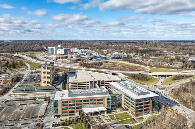 The Olentangy Freeway that cuts between Knolls-Thomas and the river will take you to OSU.