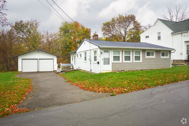 Saltbox homes pop up in Fairport, inspired by traditional New England design.