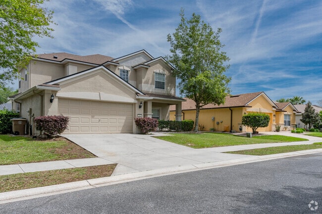 Enjoy sitting on the front porch of this spacious Southeast Ocala 2-story home.