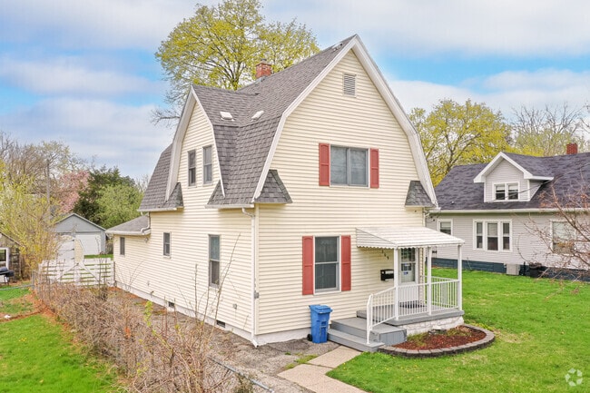 A unique Dutch Colonial home sits on a quiet street in the Northtown neighborhood.