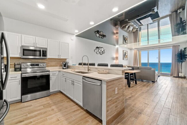 10625 Front Beach Rd unit FL13-ID1354975P, Panama City Beach, FL 32407 - photo 7