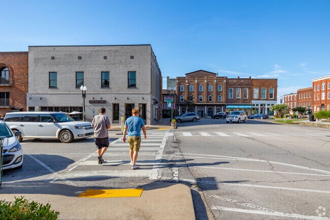 Residents stroll and shop on the weekends in Columbia's towns square.