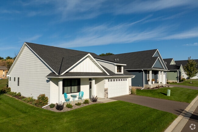 Suburban homes with landscaped lawns line a Hanover street.