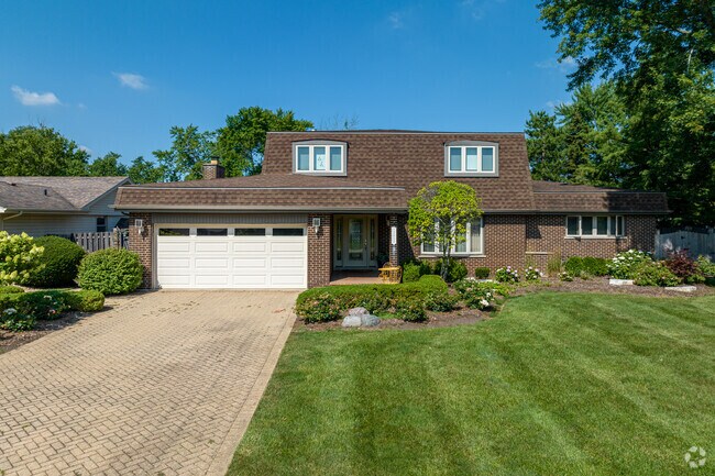 Find a beautiful split-level home, a popular home style in the Sandburg neighborhood.
