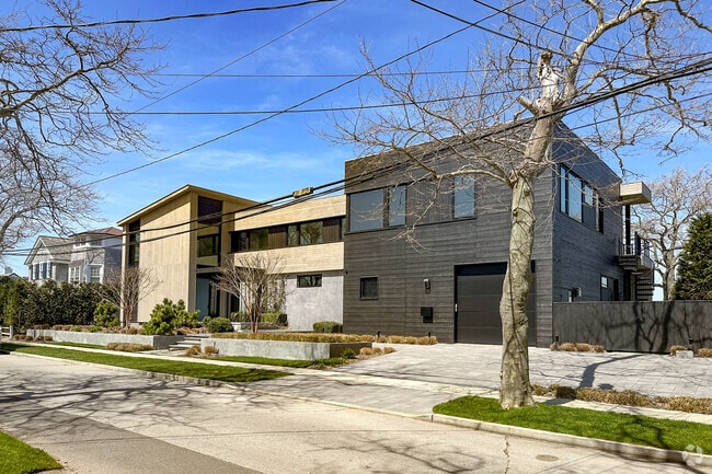 Large luxury  contemporary style homes can be found along Reynolds Channel in Atlantic Beach, NY