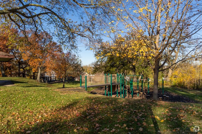 Webber Park features a playground set into the hillside for College Circle's children.