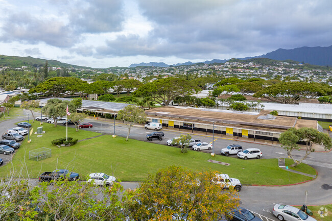 Enchanted Lake Elementary School features a drop-off area for parents and ample parking.