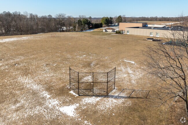 Farmington Elementary School in Kewaskum, WI has a large baseball field for its students.