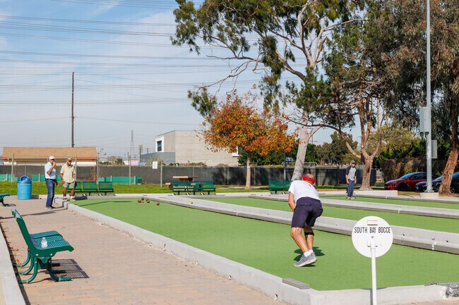Play bocce ball with friends at Columbia Park in North Torrance, CA.
