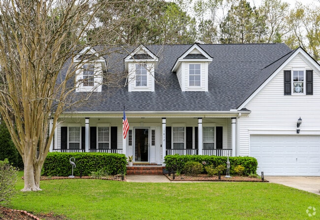 Park West showcases classic cape-style homes with manicured lawns and timeless charm.