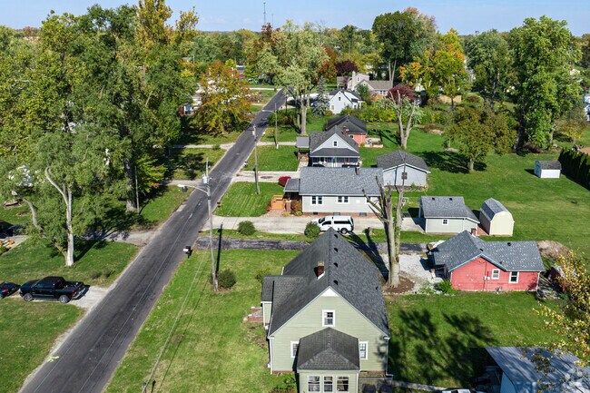 A scenic view showcasing the charming homes, within the serene neighborhood of Sand Point.