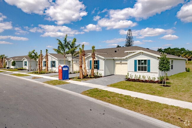 New construction homes are affordable in the Palm Greens neighborhood of Delray Beach, FL.
