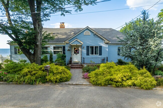 This Sound Beach home sits atop a bluff overlooking Long Island Sound.