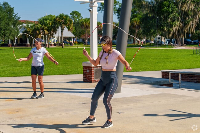 A Kissimmee resident enjoys jump roping with friends at nearby Lake Toho.