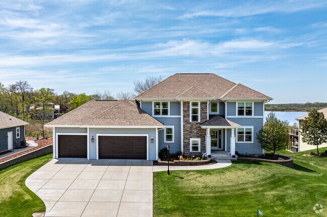 New traditional-style homes can be found on Long Lake in the Wind Lake neighborhood.