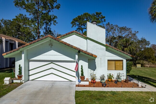 The Golf Resort Villas residents decorate their yards with freshly, planted flowers in Rosemont.
