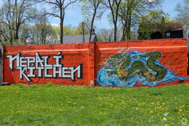 The Nepali Kitchen in North Hill features this dragon mural on the side of the building.