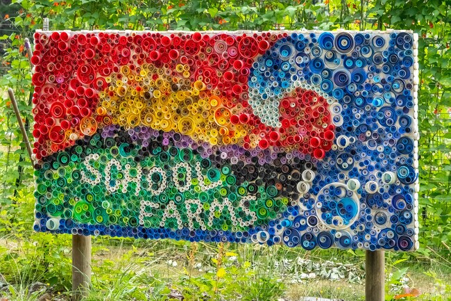 A bright & colorful creatinon by Saratoga Middle Schoolers welcomes everyone to their P-Patch.