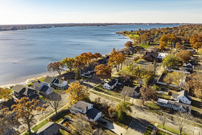 North Muskegon homes sit along the lake, showcasing serene waterfront scenery.