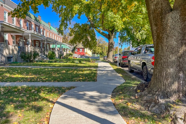 Picturesque tree-lined sidewalks run through Baltimore's Liberty Square neighborhood.