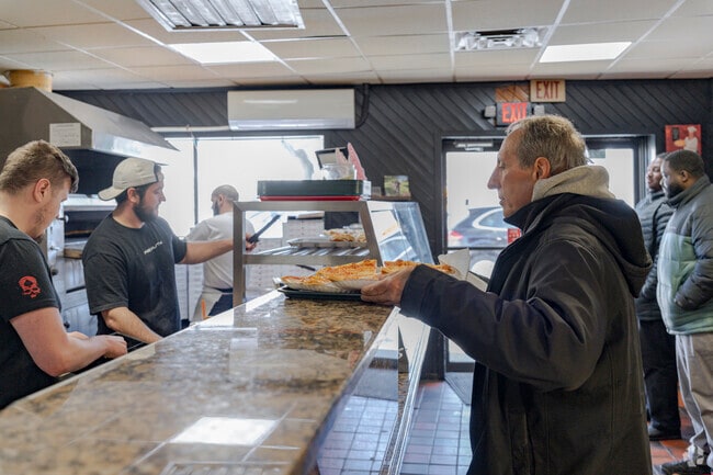 Dino’s Pizzeria is a Thornwood staple, serving up classic pies locals adore.