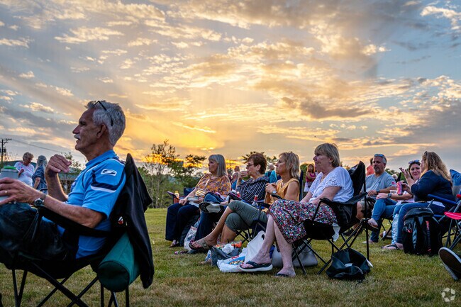 Enjoy the concert against the sunset at the Fox Lake Friday Night Concert Series.