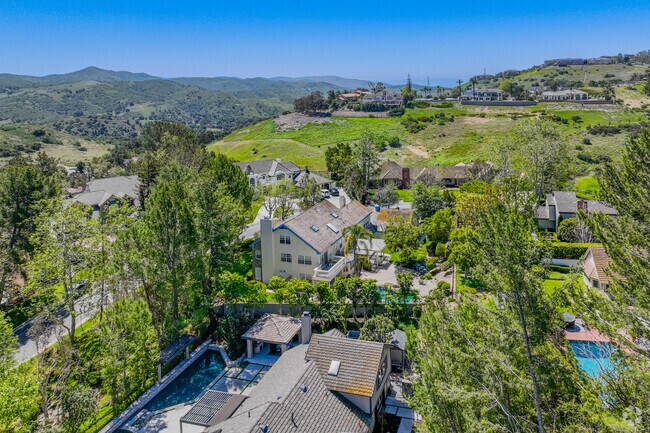Elevated view showing large homes on the edge of the residential neighborhood.