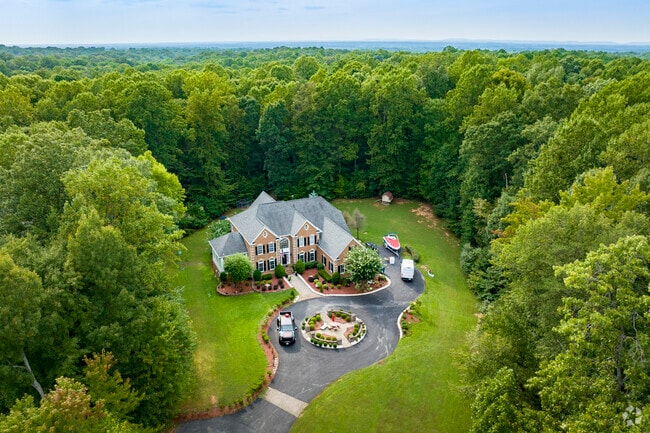 Homes in Independent Hill are tucked among trees for a peaceful, natural setting.